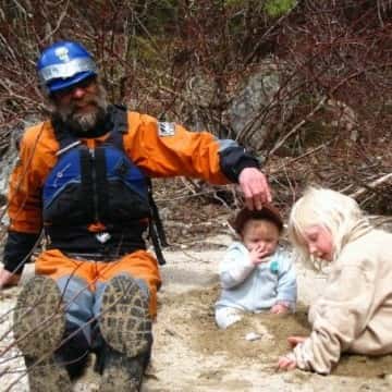 a group of men riding on the back of a man